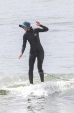 LEIGHTON MEESTER and Adam Brody at a Surfing Session in Malibu 05/10/2022