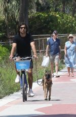 LINDSEY VONN and Diego Osorio Out on a Bike Ride in Miami Beach 05/09/2022