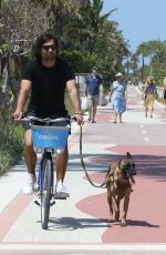 LINDSEY VONN and Diego Osorio Out on a Bike Ride in Miami Beach 05/09/2022