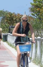 LINDSEY VONN and Diego Osorio Out on a Bike Ride in Miami Beach 05/09/2022