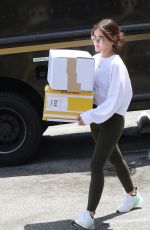 LUCY HALE Picking up Some Packages at UPS Store in Los Angeles 05/27/2022
