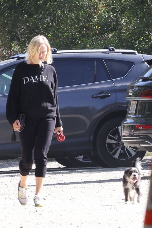 MALIN AKERMAN Out with Her Dog in Los Angeles 05/06/2022