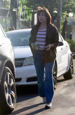 MILLA JOVOVICH Out on Melrose Place in West Hollywood 05/16/2022