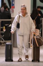 MOLLY MAE HAGUE and Tommy Fury at Heathrow Airport in Los Angeles 05/12/2022