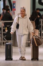 MOLLY MAE HAGUE and Tommy Fury at Heathrow Airport in Los Angeles 05/12/2022