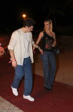 NICOLA PELTZ and Brooklyn Beckham Arrives at Carbone in Miami 05/08/2022