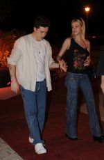 NICOLA PELTZ and Brooklyn Beckham Arrives at Carbone in Miami 05/08/2022