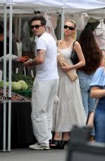 NICOLA PELTZ and Brooklyn Beckham at Farmer