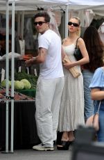 NICOLA PELTZ and Brooklyn Beckham at Farmer