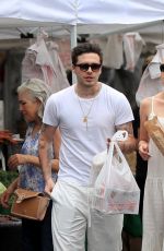 NICOLA PELTZ and Brooklyn Beckham at Farmer