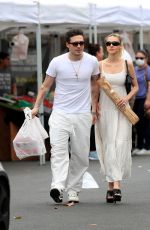 NICOLA PELTZ and Brooklyn Beckham at Farmer