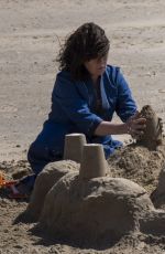 OLIVIA COLMAN Makes Sandcastles on Camber Sands Beach 05/12/2022