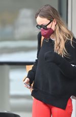 OLIVIA WILDE at JFK Airport in New York 05/19/2022