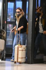 OLIVIA WILDE at Newark Airport 05/21/2022