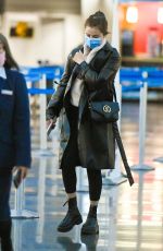SELENA GOMEZ Arrives at JFK Airport in New York 05/08/2022