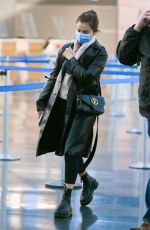 SELENA GOMEZ Arrives at JFK Airport in New York 05/08/2022