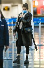 SELENA GOMEZ Arrives at JFK Airport in New York 05/08/2022