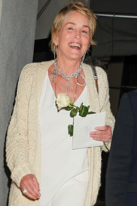 SHARON STONE Leaves Craig’s in West Hollywood 05/08/2022