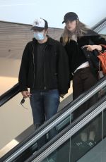 SUKI WATERHOUSE and Robert Pattinson at LAX Airport in Los Angeles 05/16/2022