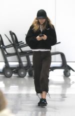 SUKI WATERHOUSE at LAX Airport in Los Angeles 05/16/2022