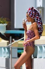 TAYLOR HILL in Bikinis and Swimwear at a Photoshoot in Miami 05/12/2022