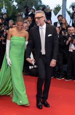 TINA KUNAKEY and Vincent Cassel at Crimes of the Future Premiere at 75th Annual Cannes Film Festival 05/23/2022