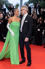 TINA KUNAKEY and Vincent Cassel at Crimes of the Future Premiere at 75th Annual Cannes Film Festival 05/23/2022