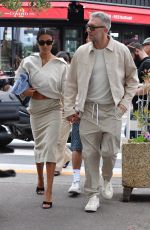 TINA KUNAKEY and Vincent Cassel Out on Croisette in Cannes 05/23/2022