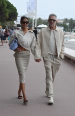 TINA KUNAKEY and Vincent Cassel Out on Croisette in Cannes 05/23/2022