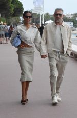 TINA KUNAKEY and Vincent Cassel Out on Croisette in Cannes 05/23/2022