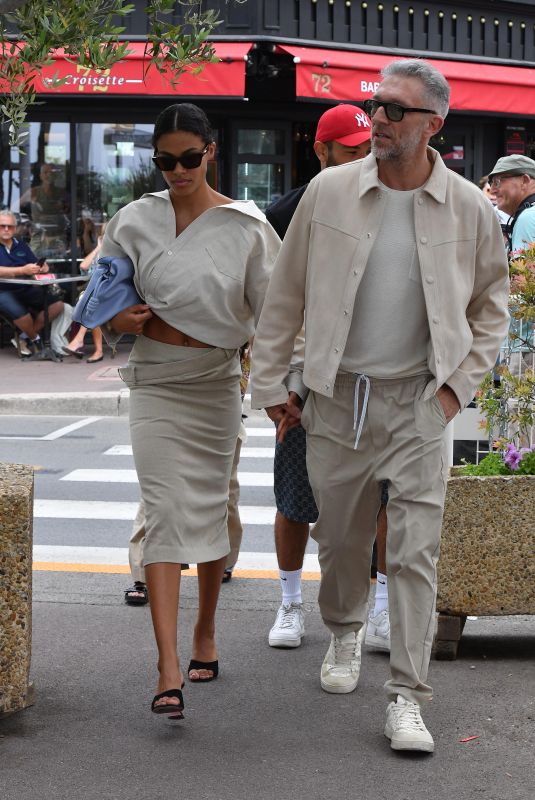TINA KUNAKEY and Vincent Cassel Out on Croisette in Cannes 05/23/2022