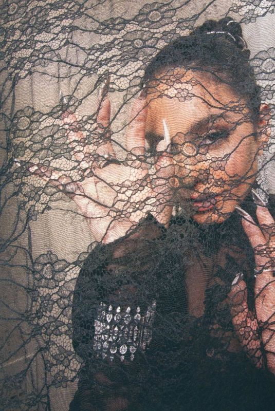 VANESSA HUDGENS at a Photoshoot 05/06/2022