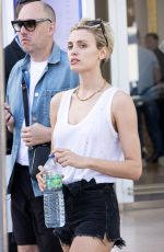 WALLIS DAY Leaves Her Hotel in Cannes 05/20/2022