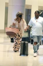 ALICIA ETHEREDGE Arrives at LAX Airport in Los Angeles 05/31/2022