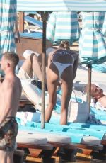 ALINA BAIKOVA in a White Bikini at a Beach in Mykonos 06/16/2022