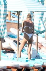 ALINA BAIKOVA in a White Bikini at a Beach in Mykonos 06/16/2022