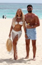 AMBER TURNER in Bikini on the Set of New Series on the Beach in Dominican Republic 06/08/2022