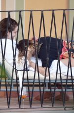 CARA DELEVINGNE and LEAH MASON Out Kissing in Portofino 06/07/2022