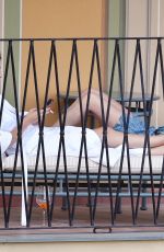CARA DELEVINGNE and LEAH MASON Out Kissing in Portofino 06/07/2022