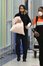 CARA DELEVINGNE Arrives at JFK Airport in New York 06/02/2022