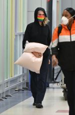 CARA DELEVINGNE Arrives at JFK Airport in New York 06/02/2022