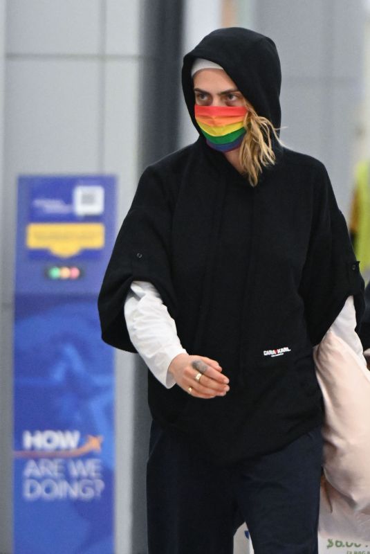 CARA DELEVINGNE Arrives at JFK Airport in New York 06/02/2022