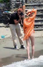 CARA DELEVINGNE at a Photoshoot in Paraggi 06/07/2022