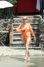 CARA DELEVINGNE at a Photoshoot in Paraggi 06/07/2022