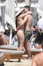 CATHERINE HARDING in Bikini and Jorginho at a Beach in Mykonos 06/16/2022