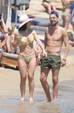 CATHERINE HARDING in Bikini and Jorginho at a Beach in Mykonos 06/16/2022
