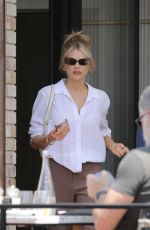 CHARLOTTE MCKINNEY Out in Los Angeles 06/20/2022