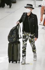 CYNDI LAUPER and David Thornton at JFK Airport in New York 06/10/2022