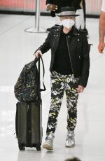 CYNDI LAUPER and David Thornton at JFK Airport in New York 06/10/2022