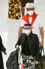 CYNDI LAUPER and David Thornton at JFK Airport in New York 06/10/2022